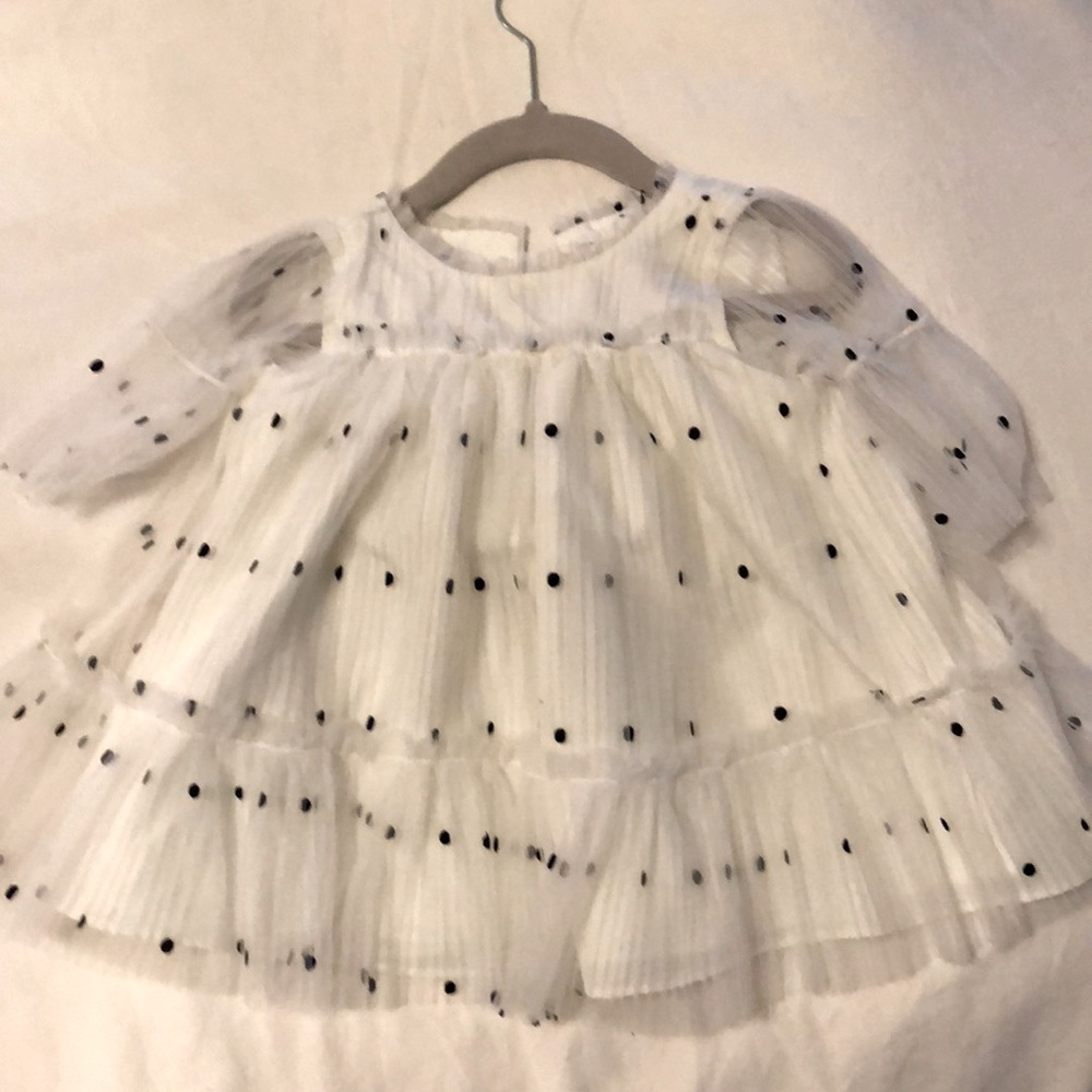 Beautiful white tulle white dress with polka dots.